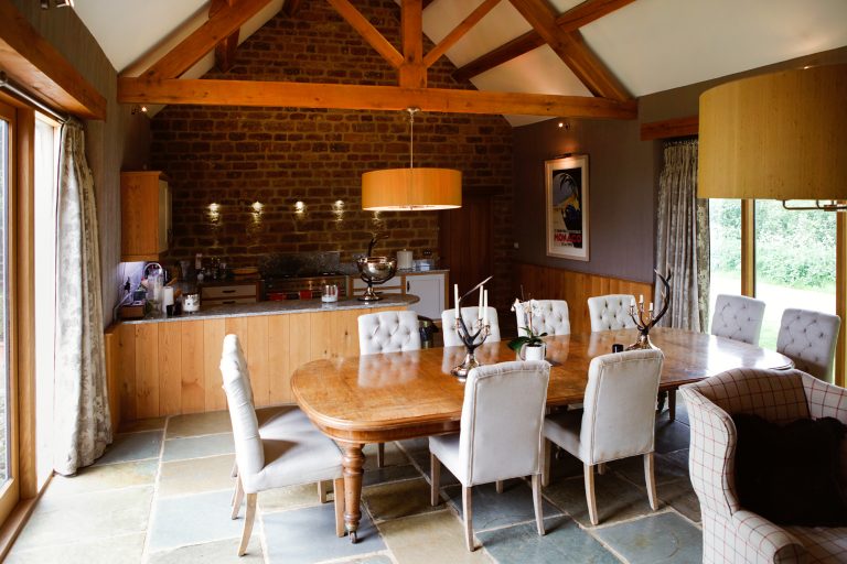 Chescombe Lodge Redevelopment by Corinium Construction: Rejuvenation and extension of old derelict barn.